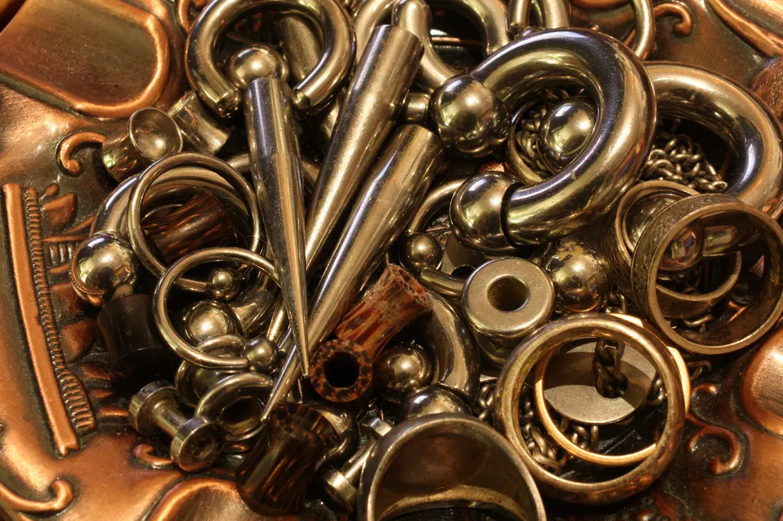 An assortment of body jewelry in a range of gauges
