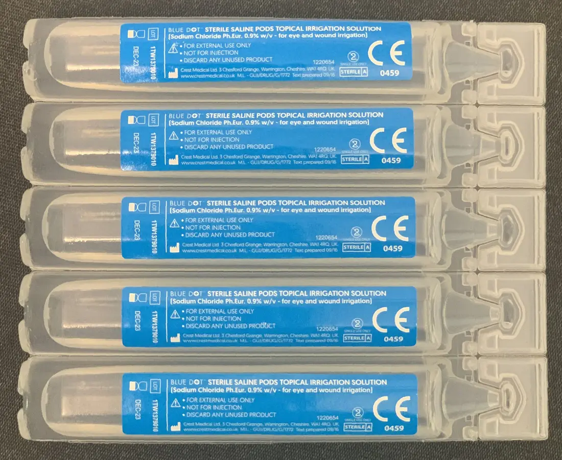 Single-use pods of sterile saline labelled 0.9% sodium chloride, the only solution a healing piercing needs